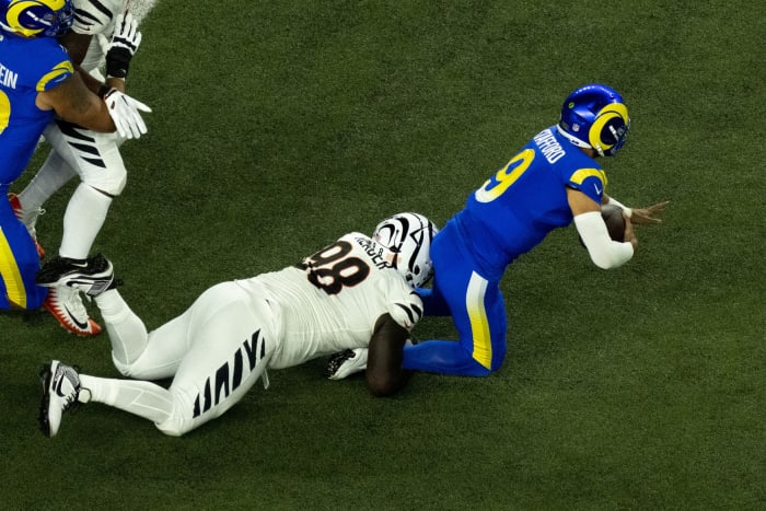 Sep 25, 2023; Cincinnati, Ohio, USA; Cincinnati Bengals defensive tackle DJ Reader (98) sacks Los Angeles Rams quarterback Matthew Stafford (9) in the first quarter of the NFL game between the Cincinnati Bengals and Los Angeles Rams at Paycor Stadium. Mandatory Credit: Albert Cesare-USA TODAY Sports